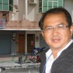 Yew Hock Ming infront of the YNH Joint Venture company offices