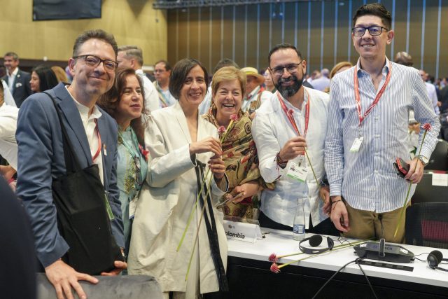 Delegates gather at the COP16 conference venue in Cali, Colombia, discussing conservation targets under the Kunming-Montreal Global Biodiversity Framework.