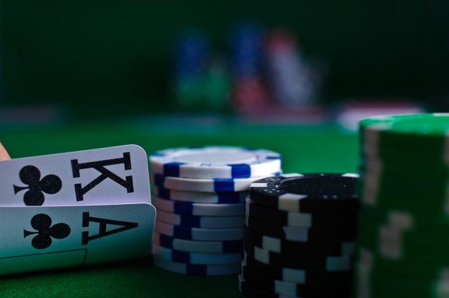UNODC report links Bangkok casinos, crypto, and underground banking to crime surge Bangkok neon-lit casino façade overlaid with glowing crypto symbols and anonymous cash exchanges.