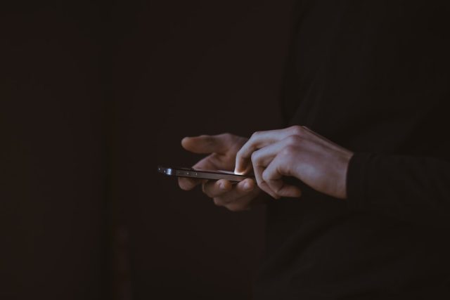 Pinterest and Snapchat app icons on a smartphone screen with a chart showing user growth trends