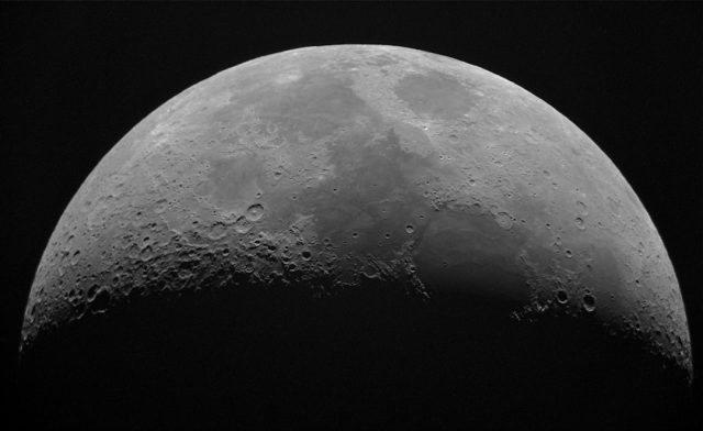 57-Year-Old Apollo 12 Lunar Photo Released by PURSUE Archive Grainy black-and-white lunar photograph with five circled areas labeled Area 1 through Area 5 above the horizon.