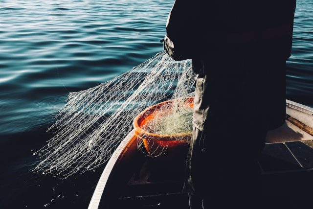 Search and rescue boats navigate choppy waters off the coast of Marinha Grande after a fishing vessel sank, killing three crew members.