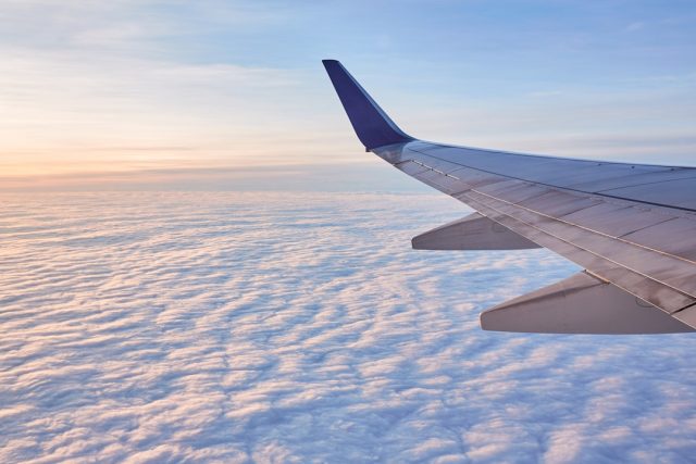 Azerbaijan Airlines cuts flights to seven Russian cities after crash Azerbaijan Airlines passenger jet parked at Heydar Aliyev International Airport in Baku, with runway and terminal visible.
