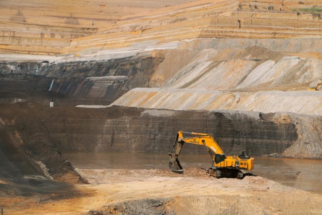 Rescue workers search through debris at the entrance of a coal mine in Singidi, Balochistan, after a deadly explosion.