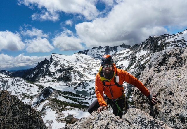 Rescue crews dig through deep snow debris in Alaska's Chugach Mountains searching for buried skiers