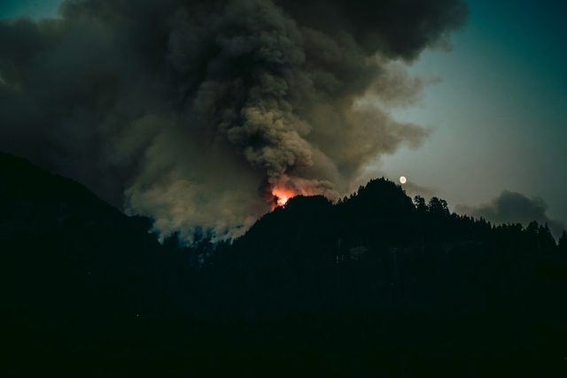 Flames and smoke tear across dry grassland under strong winds in Oklahoma on March 14, 2025.