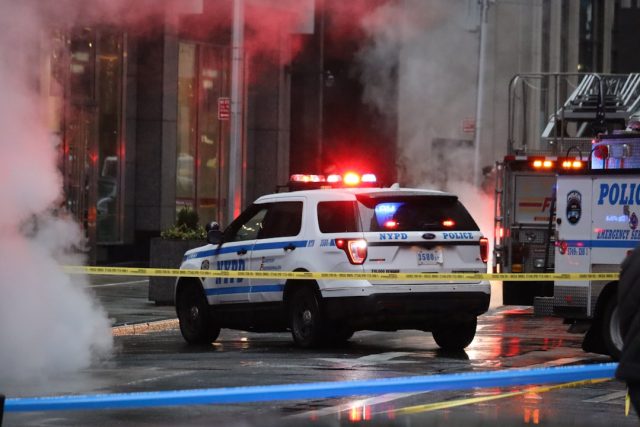Emergency responders gather outside a damaged Los Angeles County Sheriff's Department training facility in Monterey Park after a deadly explosion.