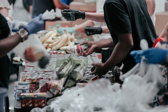 IPC Data Confirms 19.5 Million Sudanese Now Face Acute Hunger Aerial view of a dry, barren landscape in Sudan with empty market stalls and damaged infrastructure under a hazy sky