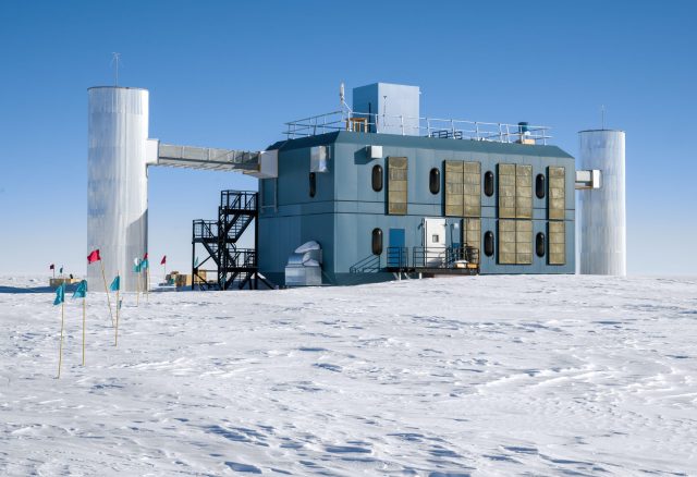 IceCube detector sensors frozen in Antarctic ice capture blue light flashes from neutrino collisions