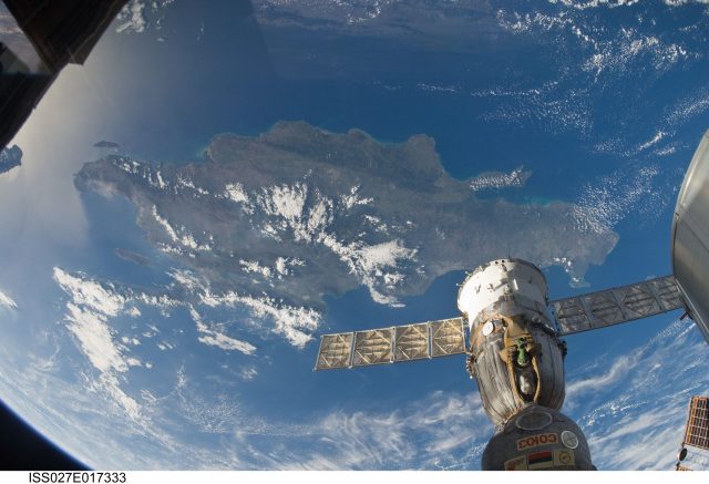 Satellite image of Tropical Storm Franklin approaching the mountainous island of Hispaniola with heavy cloud bands