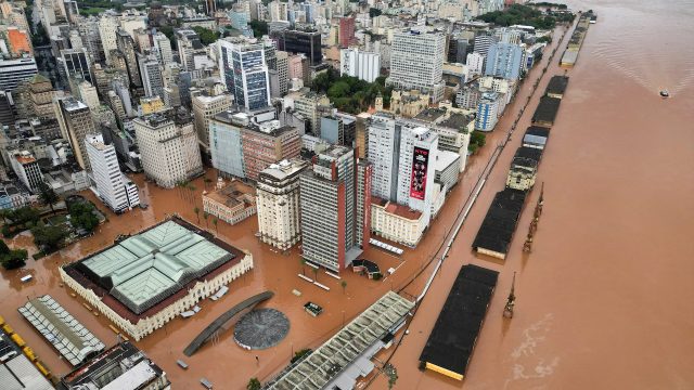 Aerial view of flooded streets and submerged buildings in Rio Grande do Sul, Brazil, after heavy rains and a dam collapse