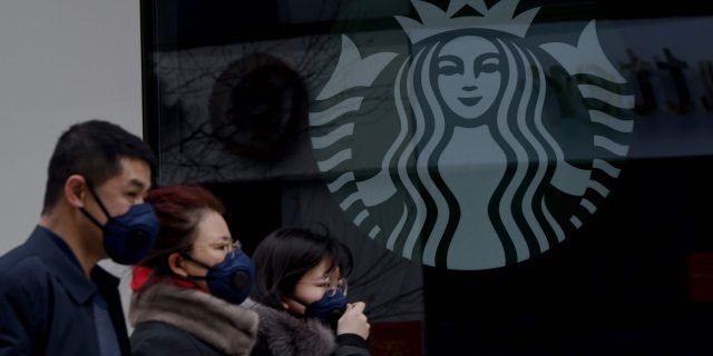 Starbucks Closed Stores China Coronavirus A Starbucks store in China with its shutters down and a sign indicating temporary closure due to the coronavirus outbreak.