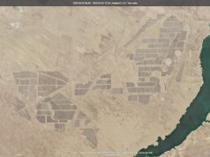 Talatan Solar Park Hits 21 GW Capacity in China Aerial view of the Talatan Solar Park's vast array of solar panels stretching across the Tibetan Plateau in Qinghai Province, China.