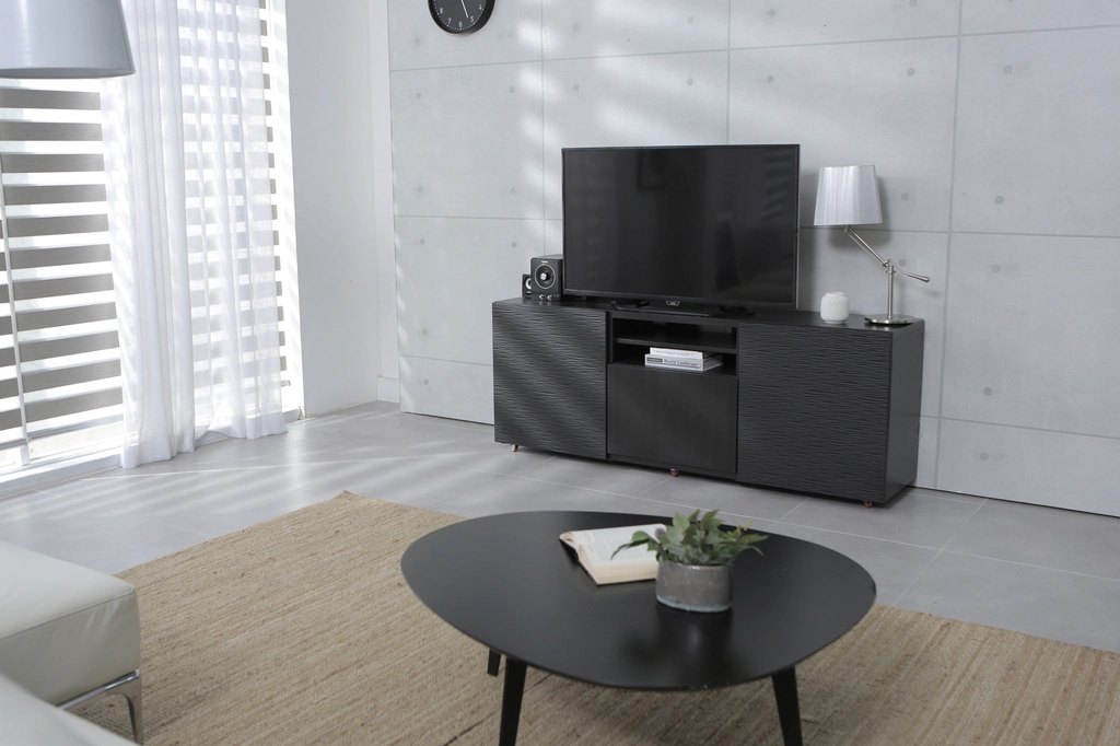 Minimalist Palette and Furniture Define Functional Living Spaces